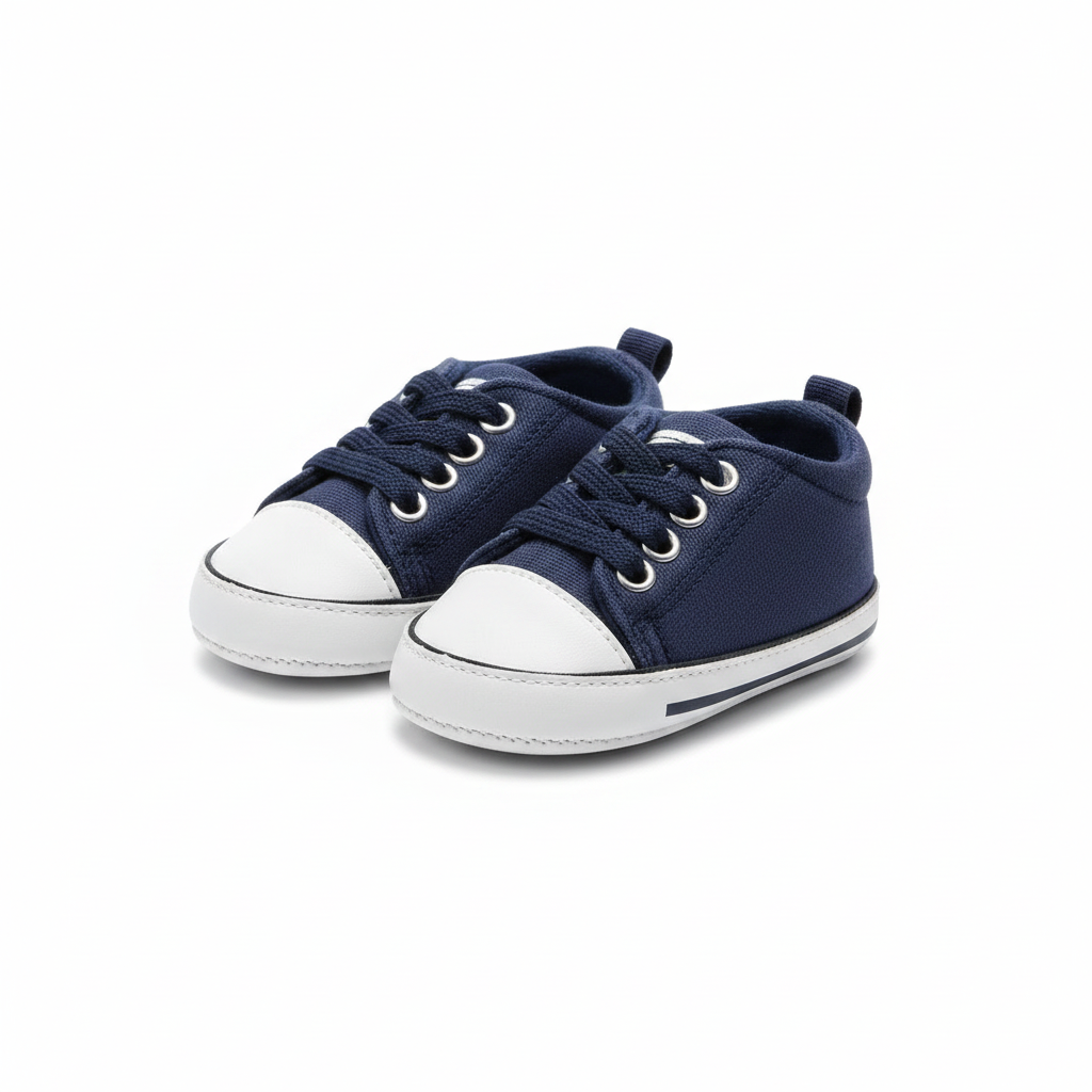 Mörkblå babysneakers med vit tåcap – par 3/4-vy, vit bakgrund